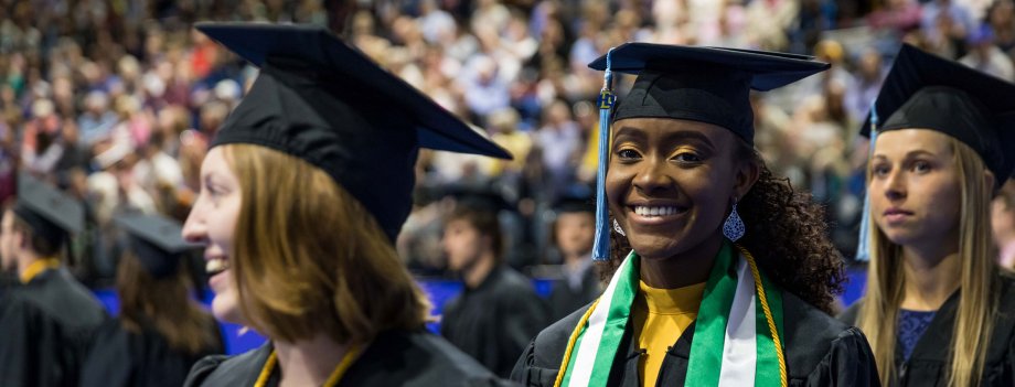 Students enter Frost arena for commencement