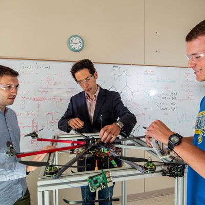 Dr. Ciarcia and students testing drones