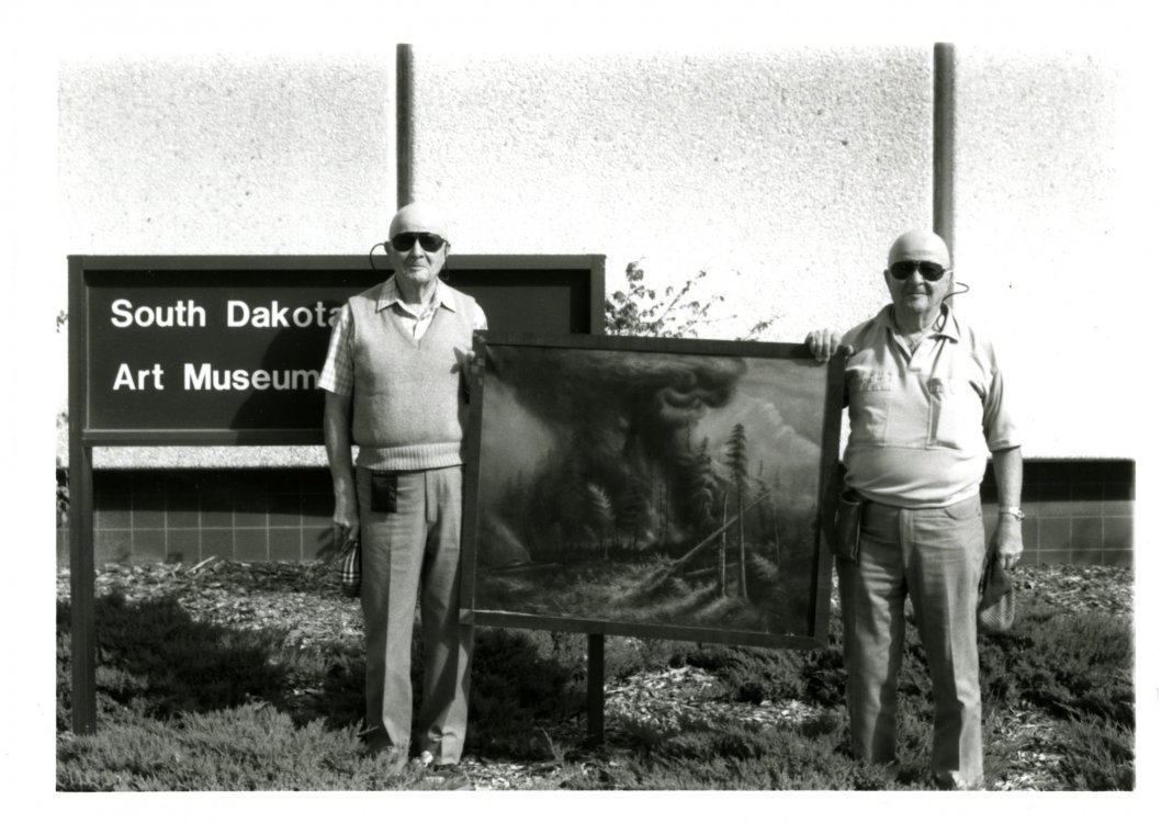 Glenn E. and Duane H. Engebretson with Laura Rodger's untitled painting, donated to South Dakota Art Museum in 1997.