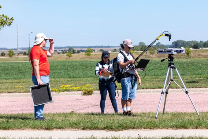 Larry Leigh and two graduate students take measurements using ASD Field Spec