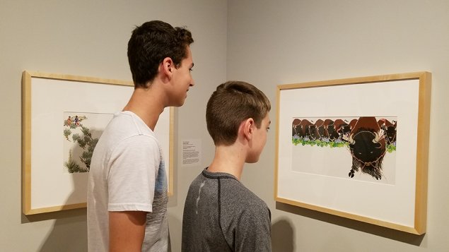 Two students viewing artwork at the Art Museum