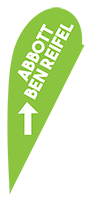 Green directional flag showing with an arrow pointing north.